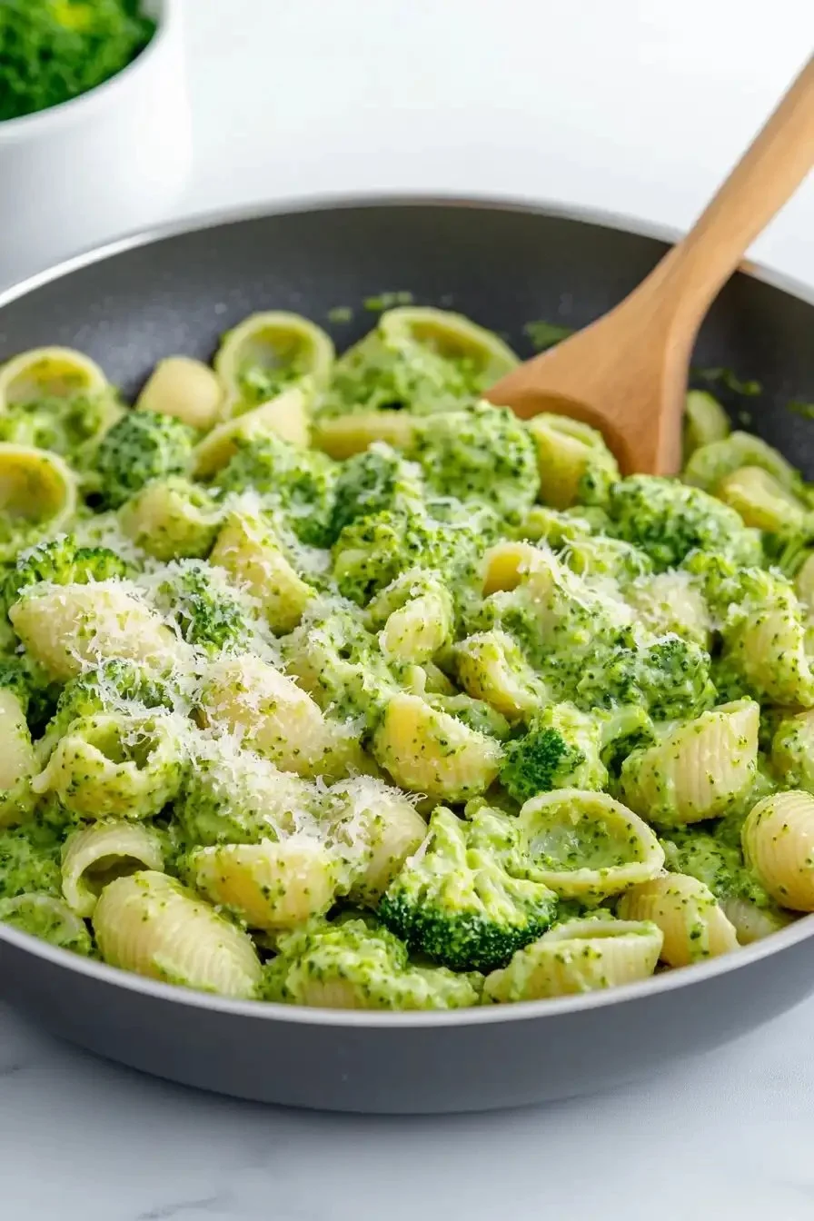Light and healthy broccoli pasta served in a bowl garnished with herbs